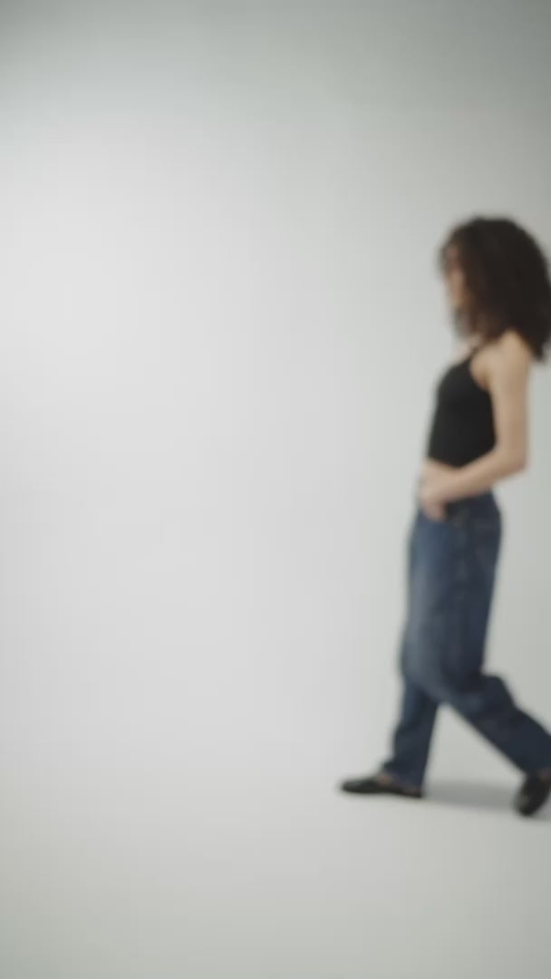 Caroline mid-rise barrel-leg jean in Rinse wash — video | Maison Arca